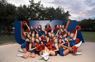 Team Photo in front of UTSA statue